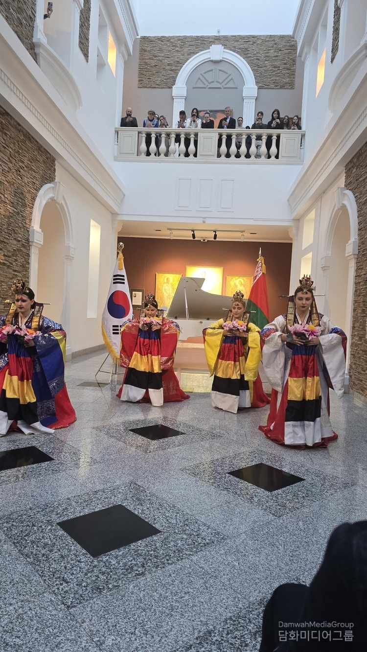 The Belarusian folk dance troupe presents a celebratory performance at the opening ceremony.